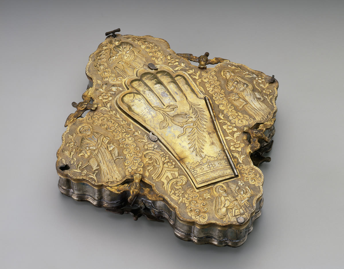 The 18th-century reliquary case of St. Abulmuse, shaped around an open hand